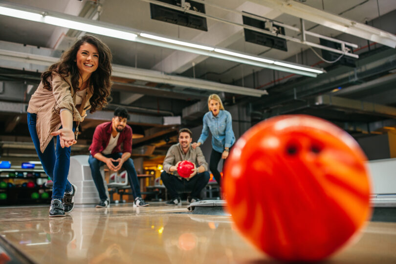 Shot,Of,An,Attractive,Brunette,Throwing,The,Bowling,Ball